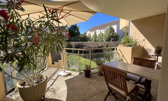 78 m² appartement met balkon, terras en tuin te koop in het hart van de stad